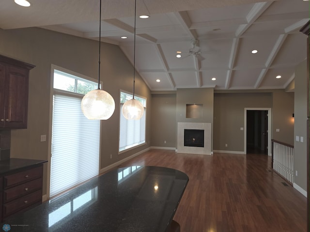 716 Northridge Way W, Fargo, ND 58078 - unfurnished living room featuring a ceiling fan, dark wood-type flooring, recessed lighting, beamed ceiling, and coffered ceiling