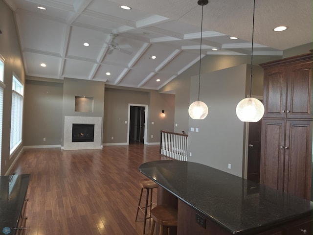 716 Northridge Way W, Fargo, ND 58078 - living room with ceiling fan, recessed lighting, dark wood-style flooring, a fireplace, and coffered ceiling