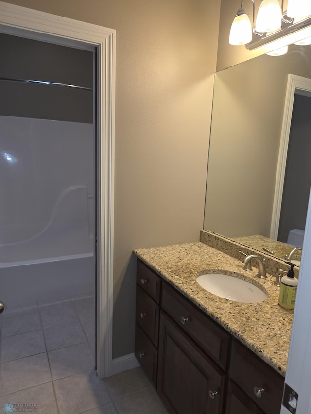 716 Northridge Way W, Fargo, ND 58078 - bathroom with vanity, tile patterned floors, and bathtub / shower combination