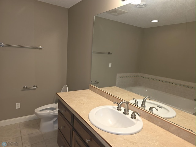 716 Northridge Way W, Fargo, ND 58078 - bathroom featuring a garden tub, vanity, and tile patterned floors