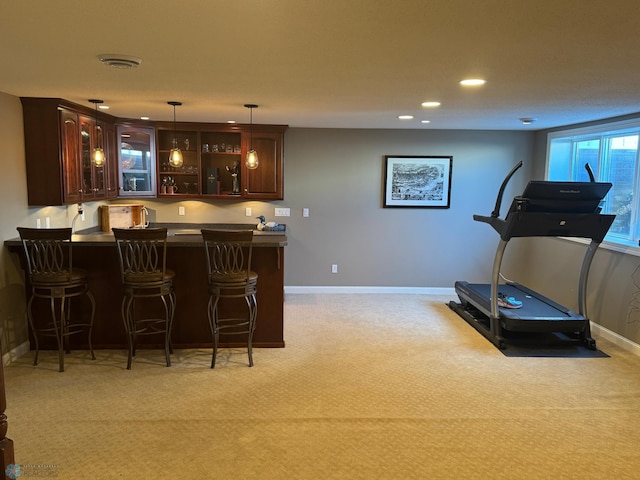 716 Northridge Way W, Fargo, ND 58078 - indoor wet bar with light carpet, hanging light fixtures, and recessed lighting