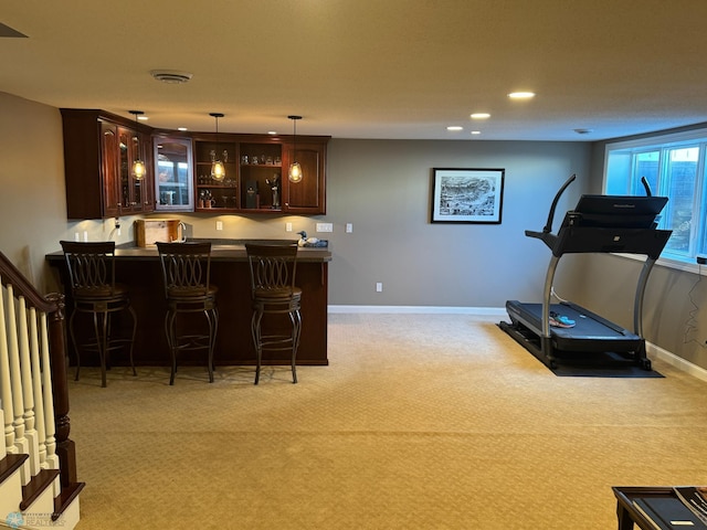 716 Northridge Way W, Fargo, ND 58078 - indoor wet bar featuring light carpet, stairway, decorative light fixtures, and recessed lighting