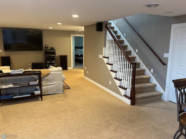716 Northridge Way W, Fargo, ND 58078 - living room with light carpet, stairway, and recessed lighting
