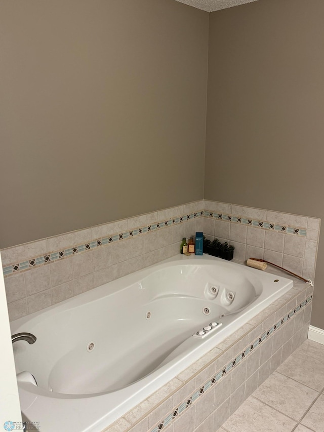 716 Northridge Way W, Fargo, ND 58078 - bathroom with a jetted tub and tile patterned floors