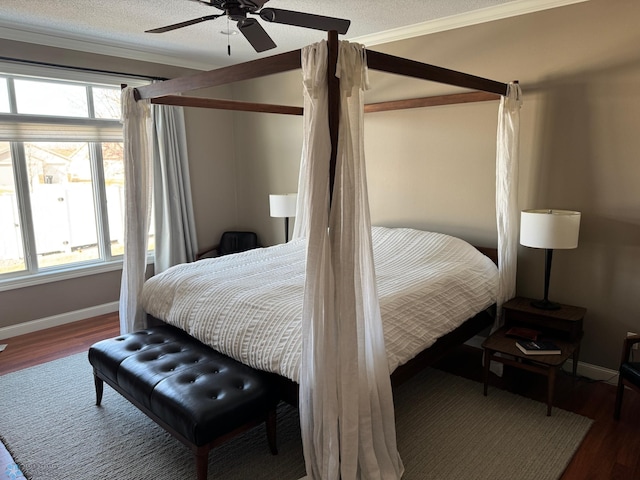 716 Northridge Way W, Fargo, ND 58078 - bedroom featuring wood finished floors, ornamental molding, and a ceiling fan