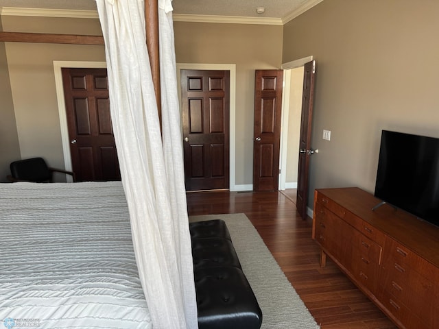 716 Northridge Way W, Fargo, ND 58078 - bedroom with crown molding and dark wood-type flooring