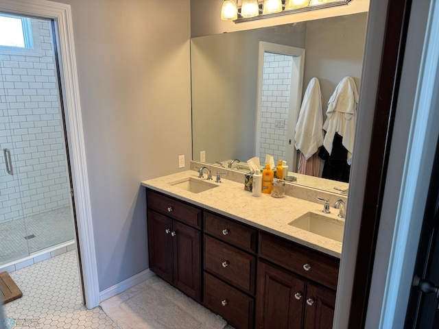 716 Northridge Way W, Fargo, ND 58078 - full bath with double vanity, a shower stall, and tile patterned floors