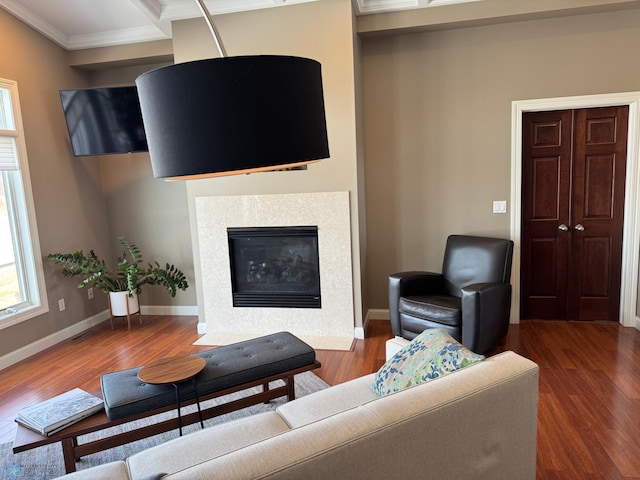 716 Northridge Way W, Fargo, ND 58078 - living room featuring ornamental molding, wood finished floors, and a tile fireplace