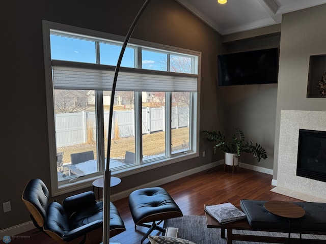 716 Northridge Way W, Fargo, ND 58078 - living room with wood finished floors, a tile fireplace, and crown molding