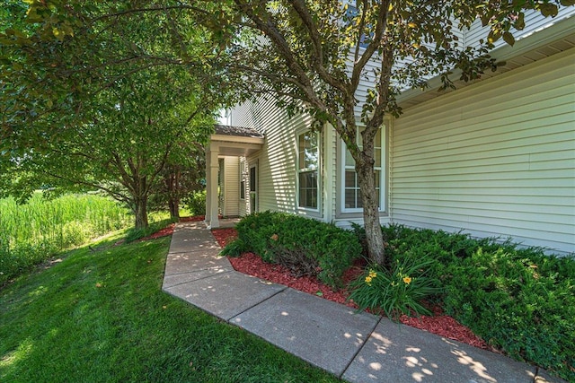 16901 90th Ct N, Maple Grove, MN 55311 - property entrance featuring a lawn