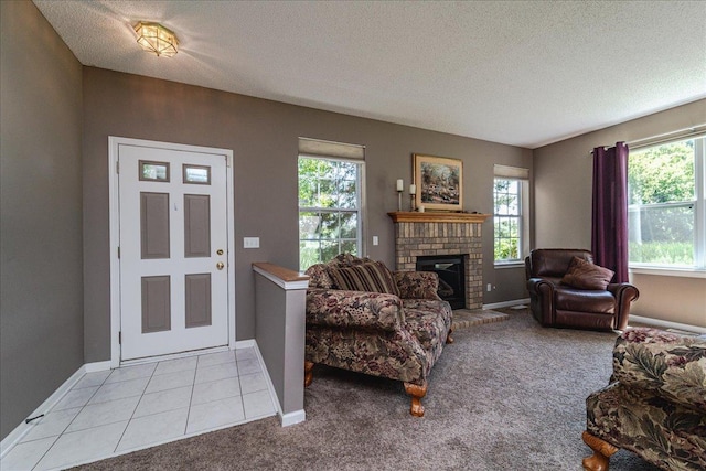 16901 90th Ct N, Maple Grove, MN 55311 - living room with plenty of natural light, a textured ceiling, a brick fireplace, and light colored carpet