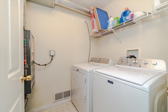 16901 90th Ct N, Maple Grove, MN 55311 - washroom featuring separate washer and dryer and baseboards