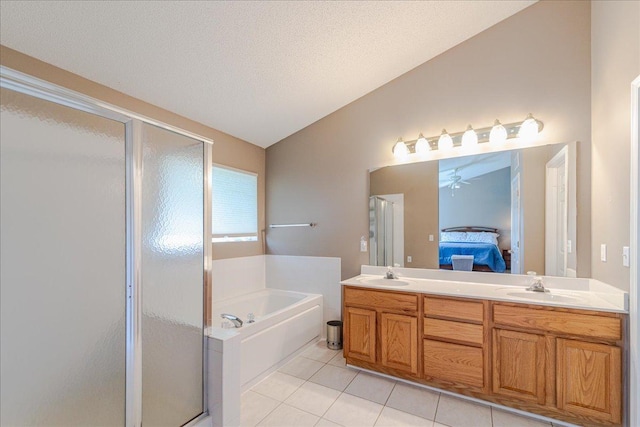 16901 90th Ct N, Maple Grove, MN 55311 - full bath with a stall shower, a garden tub, tile patterned floors, double vanity, and vaulted ceiling