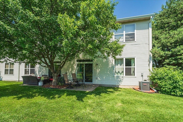 16901 90th Ct N, Maple Grove, MN 55311 - back of property featuring a yard and a patio