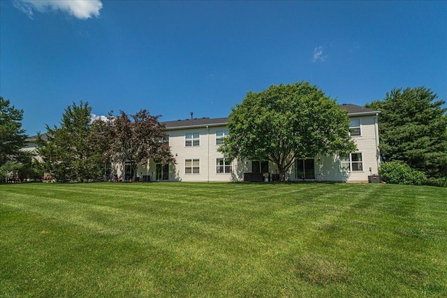 16901 90th Ct N, Maple Grove, MN 55311 - rear view of property with a lawn