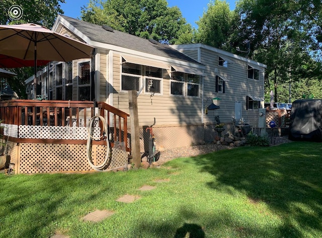 25663 Circle Dr, Garrison, MN 56401 - rear view of house with a lawn