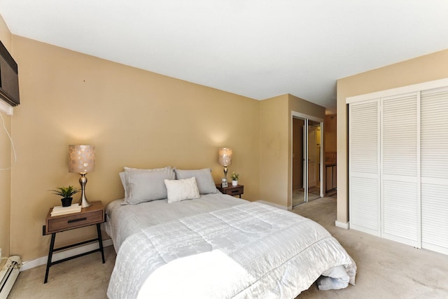 4151 Boone Ave N Unit 210, New Hope, MN 55427 - bedroom featuring light colored carpet, a baseboard radiator, and a closet