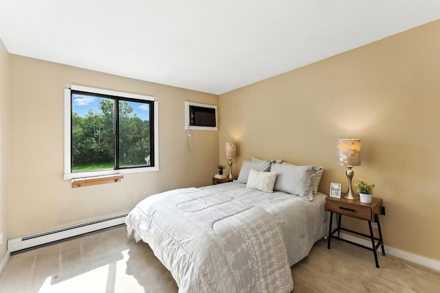 4151 Boone Ave N Unit 210, New Hope, MN 55427 - bedroom with baseboard heating, a wall mounted AC, and carpet floors