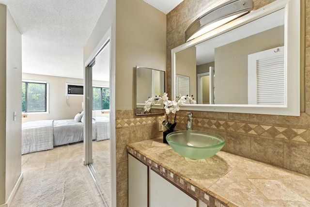 4151 Boone Ave N Unit 210, New Hope, MN 55427 - ensuite bathroom with tile walls and vanity
