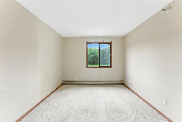4151 Boone Ave N Unit 210, New Hope, MN 55427 - empty room featuring baseboard heating and carpet floors