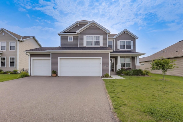 2878 Kama Ave NE, Saint Michael, MN 55376 - view of front of property featuring asphalt driveway and a front lawn