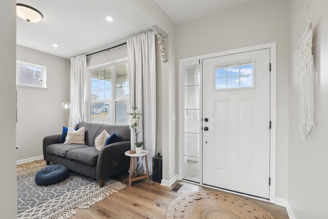 2878 Kama Ave NE, Saint Michael, MN 55376 - entryway featuring plenty of natural light, wood finished floors, and recessed lighting