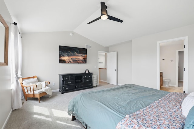 2878 Kama Ave NE, Saint Michael, MN 55376 - bedroom with vaulted ceiling, light carpet, a ceiling fan, and connected bathroom