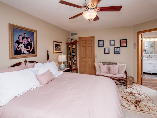 6388 Tahoe Rd, Woodbury, MN 55125 - bedroom with a sink and a ceiling fan