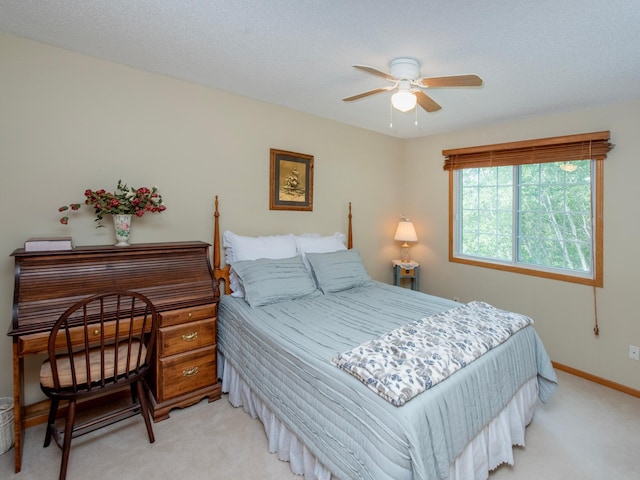 6388 Tahoe Rd, Woodbury, MN 55125 - carpeted bedroom with baseboards and a ceiling fan