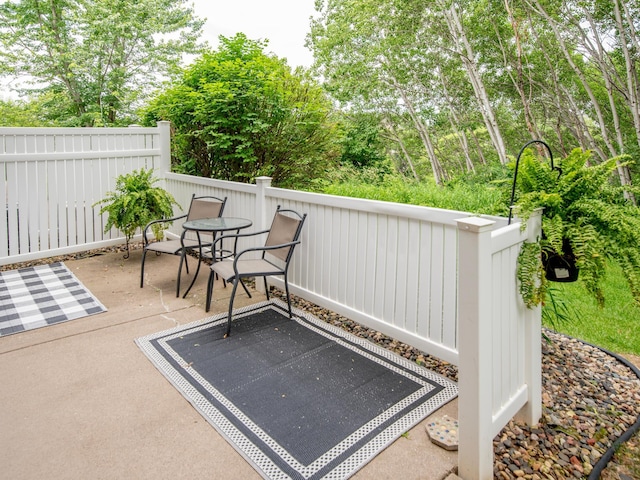 6388 Tahoe Rd, Woodbury, MN 55125 - view of patio / terrace with view of scattered trees