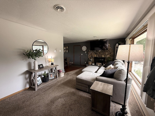 112 Orchard Cir, Montevideo, MN 56265 - living area featuring carpet, a fireplace, and a textured ceiling