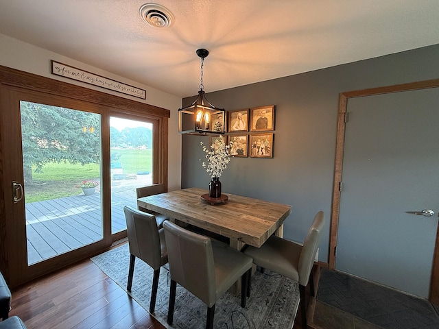 112 Orchard Cir, Montevideo, MN 56265 - dining room with a chandelier and wood finished floors