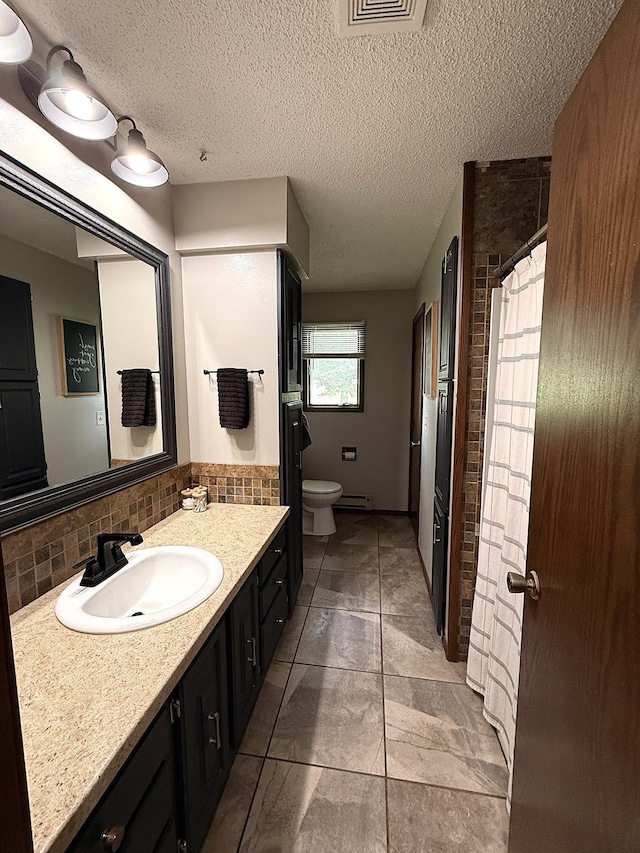 112 Orchard Cir, Montevideo, MN 56265 - full bathroom with vanity, tasteful backsplash, a textured ceiling, and a shower with curtain