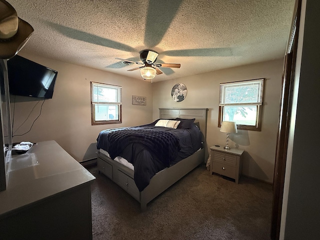 112 Orchard Cir, Montevideo, MN 56265 - bedroom with ceiling fan, carpet floors, and a textured ceiling