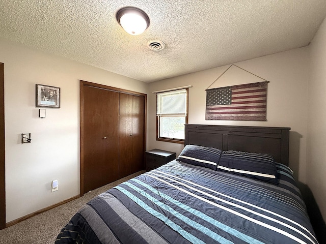 112 Orchard Cir, Montevideo, MN 56265 - bedroom featuring carpet, a closet, and a textured ceiling