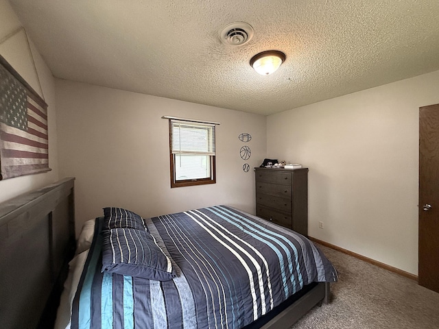 112 Orchard Cir, Montevideo, MN 56265 - bedroom with a textured ceiling and carpet floors