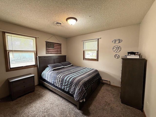 112 Orchard Cir, Montevideo, MN 56265 - carpeted bedroom with a baseboard radiator and a textured ceiling