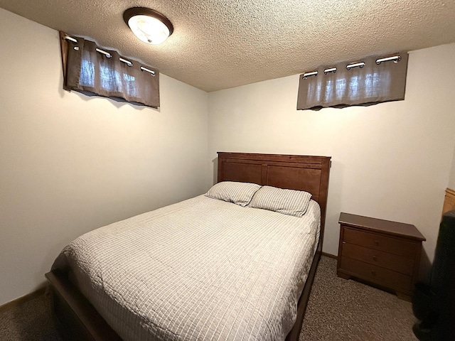 112 Orchard Cir, Montevideo, MN 56265 - carpeted bedroom featuring a textured ceiling