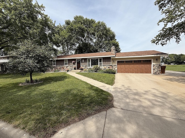 112 Orchard Cir, Montevideo, MN 56265 - single story home with stone siding, an attached garage, driveway, a front yard, and a porch
