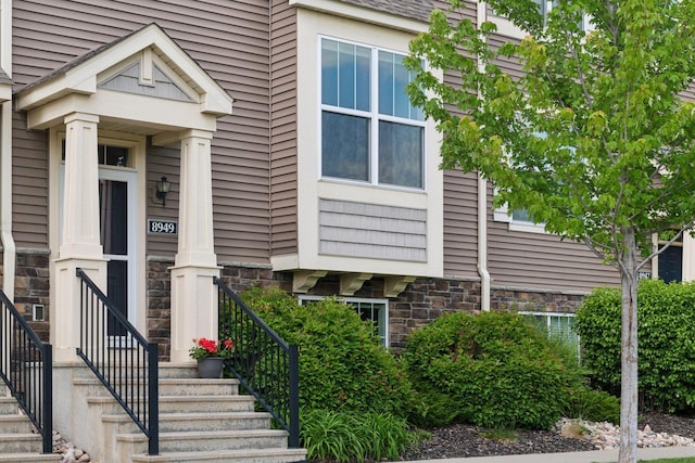 8949 Village Loop, Chanhassen, MN 55317 - view of exterior entry with stone siding