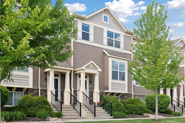 8949 Village Loop, Chanhassen, MN 55317 - townhome / multi-family property featuring stone siding