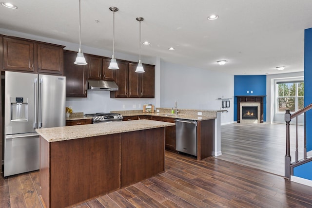 8949 Village Loop, Chanhassen, MN 55317 - kitchen with stainless steel appliances, under cabinet range hood, recessed lighting, dark wood-type flooring, and dark brown cabinetry