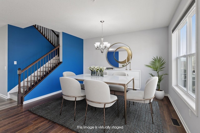 8949 Village Loop, Chanhassen, MN 55317 - dining room with stairway, wood finished floors, and a chandelier