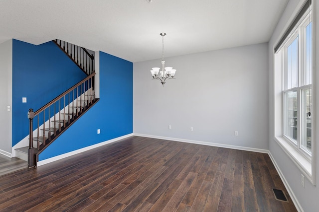 8949 Village Loop, Chanhassen, MN 55317 - spare room featuring stairs, a chandelier, and plenty of natural light