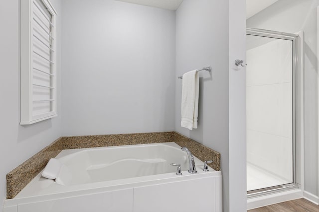8949 Village Loop, Chanhassen, MN 55317 - full bathroom with a shower stall and a bath