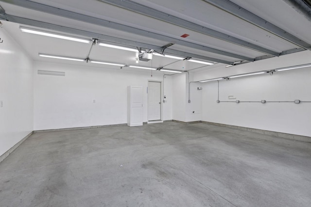 8949 Village Loop, Chanhassen, MN 55317 - garage with a garage door opener
