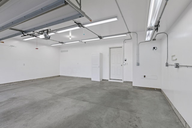 8949 Village Loop, Chanhassen, MN 55317 - garage with a garage door opener