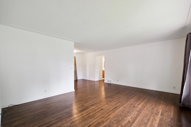 4337 Colorado Ave N, Crystal, MN 55422 - empty room featuring dark wood-style flooring and baseboards