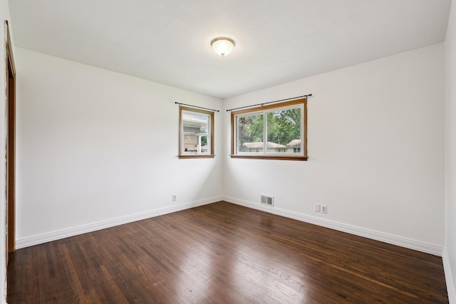 4337 Colorado Ave N, Crystal, MN 55422 - spare room featuring dark wood-style floors and baseboards