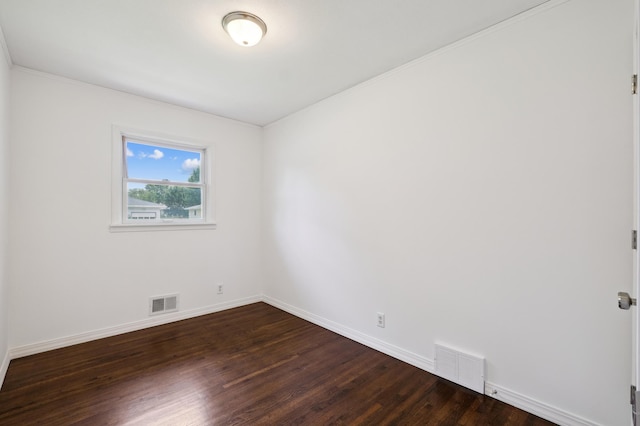 4337 Colorado Ave N, Crystal, MN 55422 - spare room featuring dark wood finished floors and ornamental molding